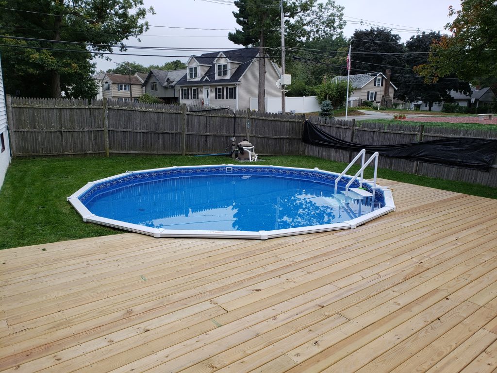 Big deck small semi-inground pool